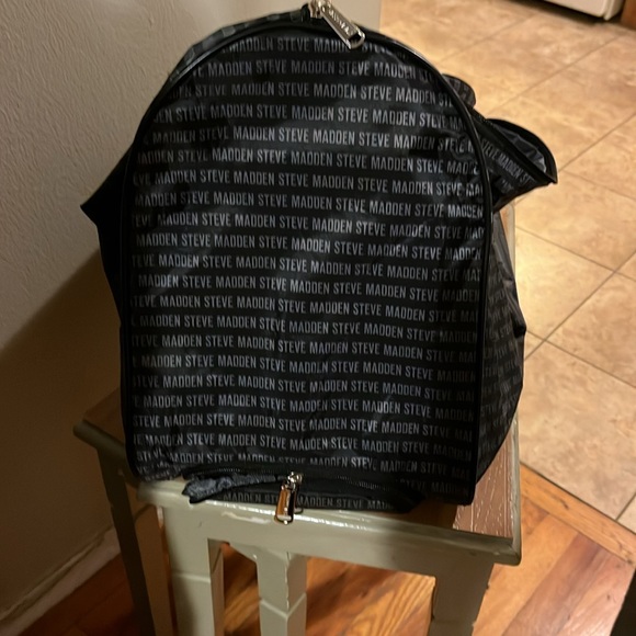 Black with Steve Madden written on it in gray large duffle bag - Picture 3 of 5